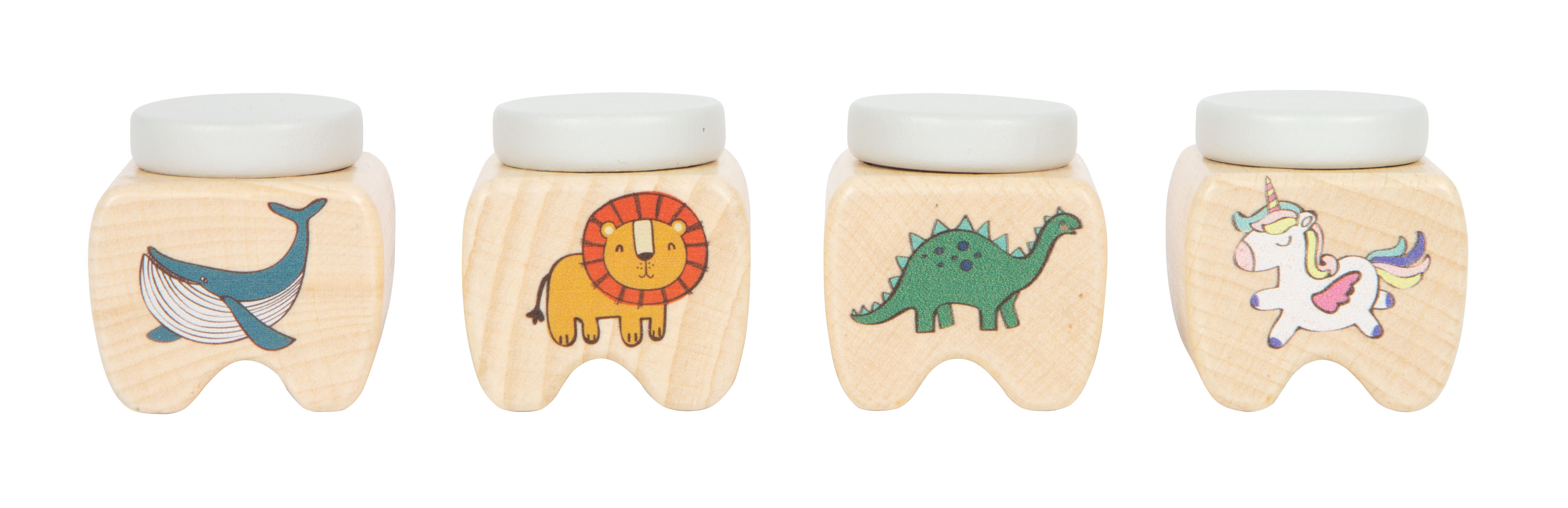 Vier Milchzahndosen mit den Motiven Wal, Löwe, Dino und Einhorn