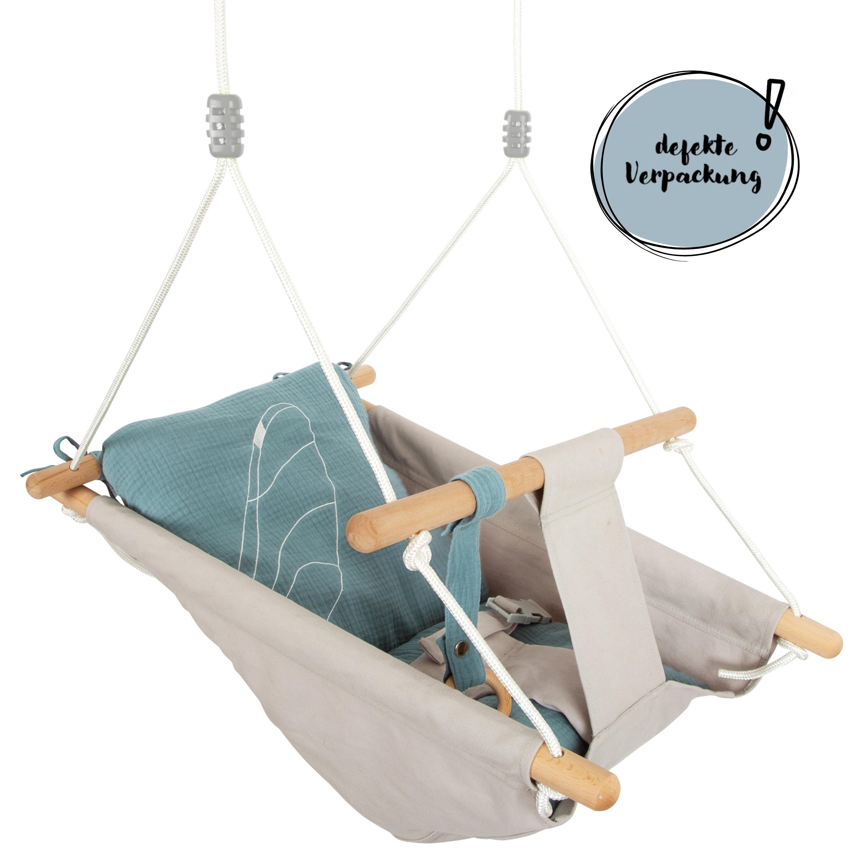 Babyschaukel aus Holz und Stoff mit defekter Verpackung