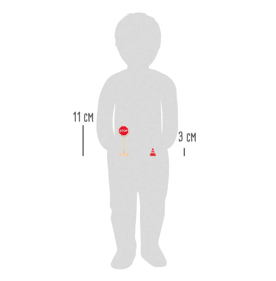 Kind spielt im Kinderzimmer mit Parkhaus